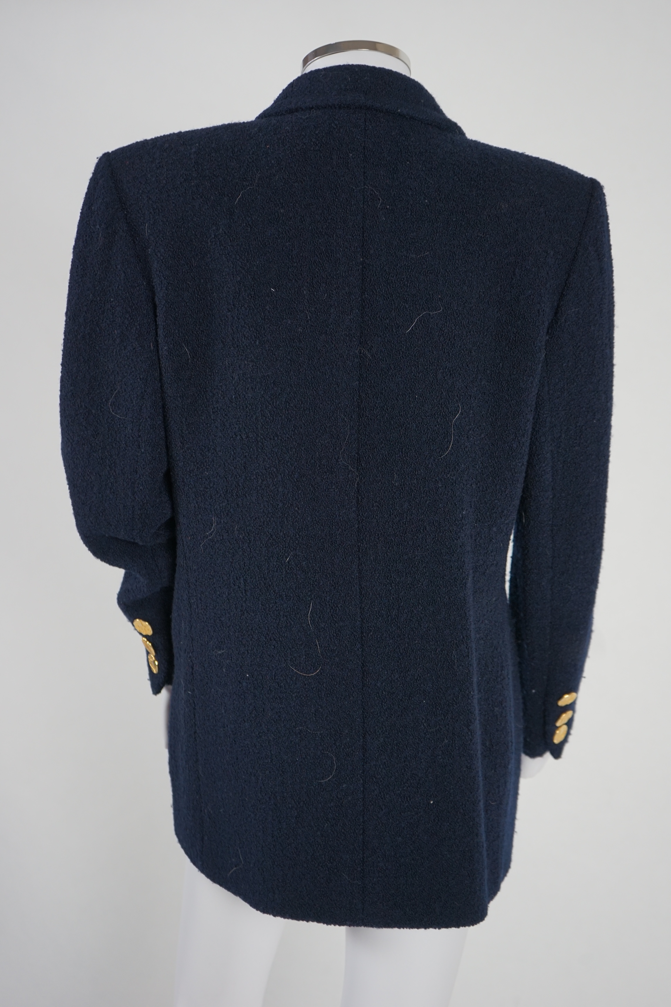 A vintage Yves Saint Laurent variation lady's navy blue wool textured blazer, F 40 (UK 12). Proceeds to Happy Paws Puppy Rescue